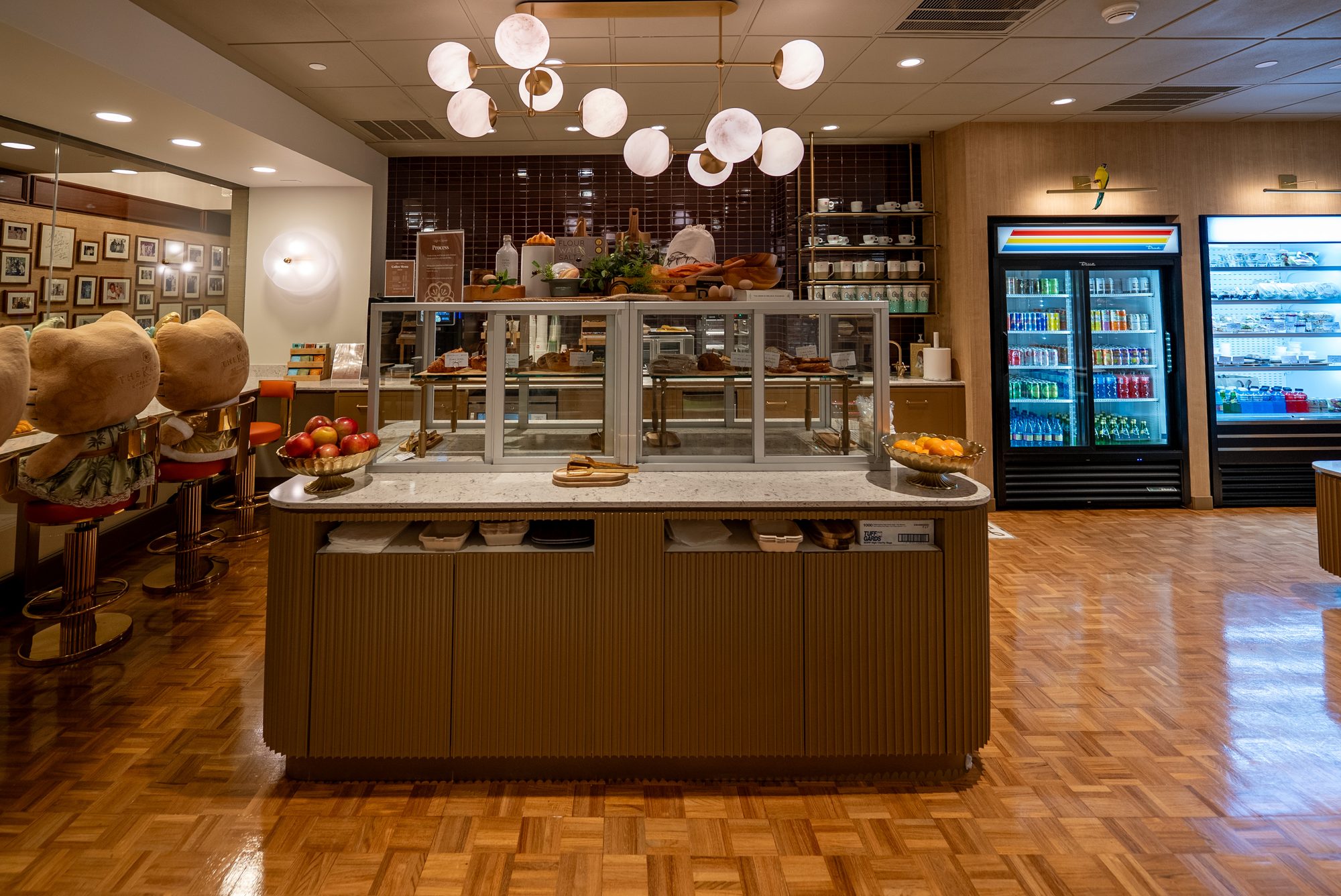 Kahala Hotel Kaffe café with pastry display and pendant lighting